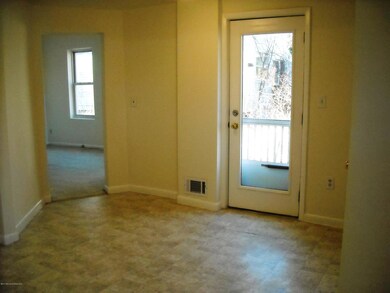 Eat in kitchen area with door to deck