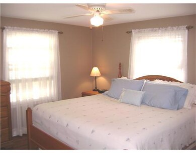 Bedroom. refinished hardwoods and new paint