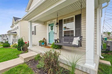 Gorgeous little porch to sit and swing.