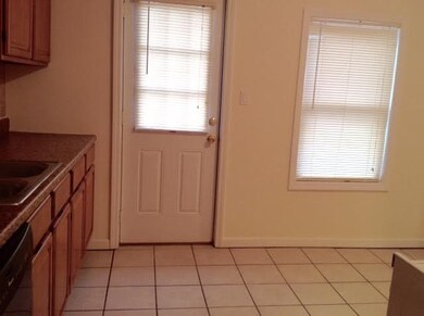 Entrance from Lomicka into kitchen.  Entire main l