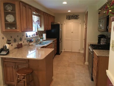 The kitchen is off the dining room has been update