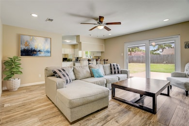 Large living area opens to kitchen.  Custom double