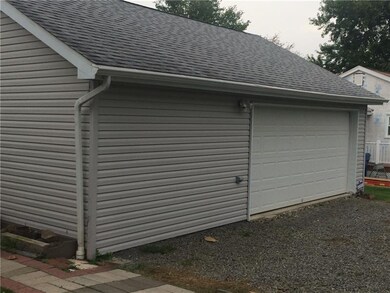 large 2-car garage with addition storage/work spac