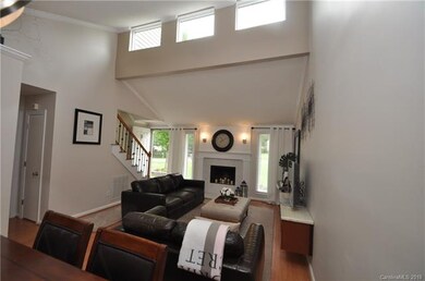 The windows above the living room add so much natu