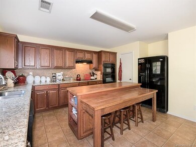 Additional view of kitchen and breakfast bar