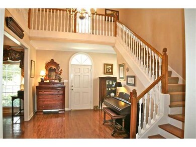 Gracious Entry with hardwood floors and two story 
