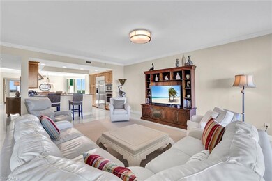 Living room featuring ornamental molding