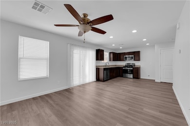 Kitchen with appliances with stainless steel finis