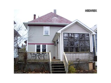 Rear of 1453 Alameda, Lakewood showing Kitchen windows and deck.