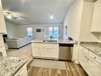 Kitchen Opens to Breakfast & Family Areas