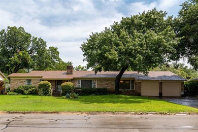 Mature landscaping with a producing garden and and