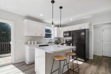 You have plenty of room to prepare meals on your beautiful kitchen island.