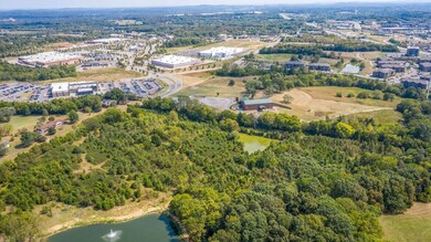 Commercial area is adjacent to this land - car dealership, home store, Walmart, and much more within half a mile or less!