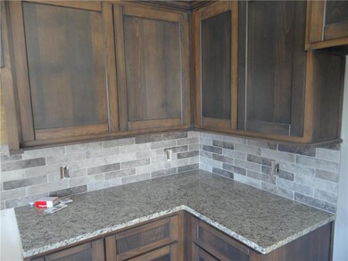 Granite tops and custom cabinets throughout home!!