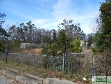 Empty lot with potential for new construction.