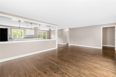 Living room with opening to kitchen