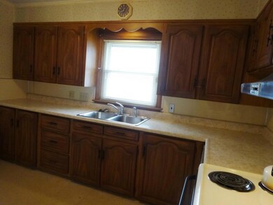 The layout offers ample counter and...