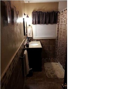 CHECK OUT THE CUSTOM TILE WORK AND GRANITE. BETTER
