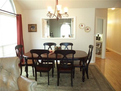 Dining area with opening to kitchen