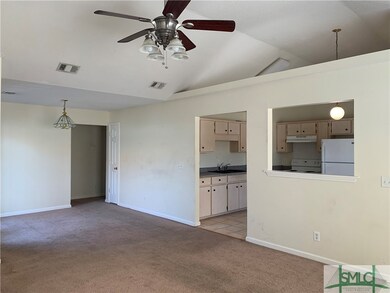 Kitchen has view of Living Room and Dining Room