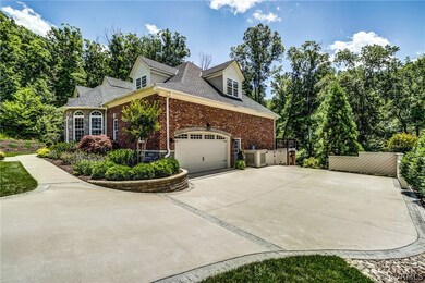 View of 2-Car Garage & Driveway