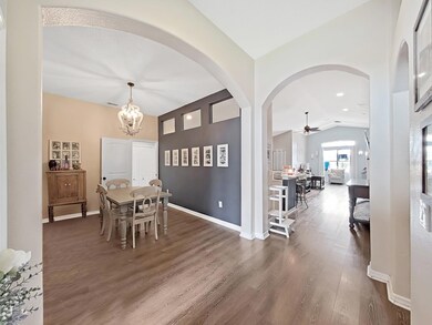 View inside the front door into the dining room and living room areas.