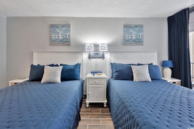 Bedroom featuring a textured ceiling