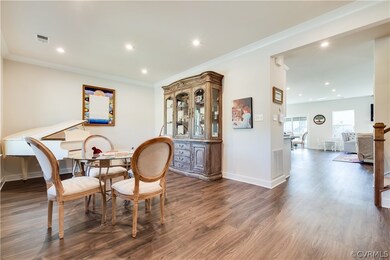 Dining room featuring dark hardwood / wood-style f