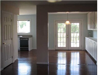 VIEW OF DINING AREA FROM LIVING ROOM