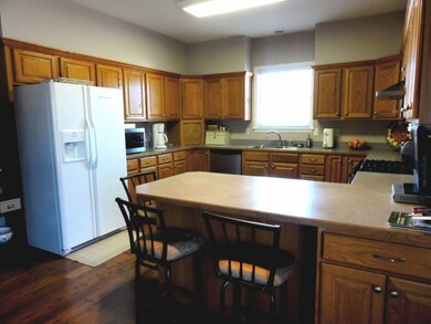 Large kitchen with bar seating