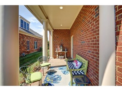 The covered Entry porch welcomes visitors and frie