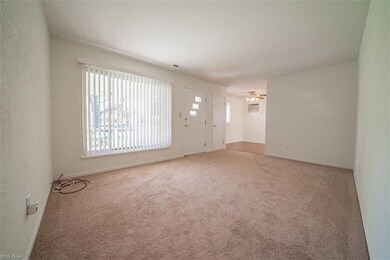 Living Room with brand new carpet (which runs thro