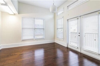Unfurnished room featuring dark wood-type flooring