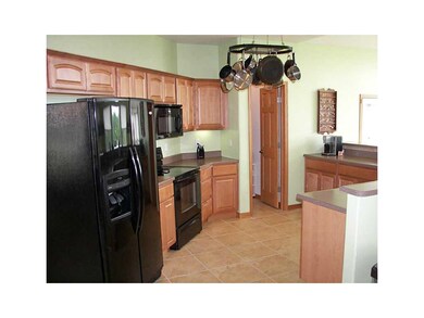 Kitchen. Surround kitchen offers upgraded applianc