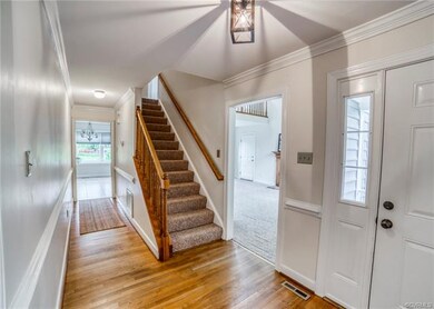 Foyer with Hardwood floors