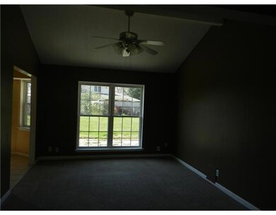 Living Room. Cathedral Ceiling with window overloo