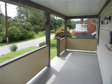 Large freshly painted front porch.