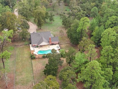 The backyard is fenced and ready for relaxation.
