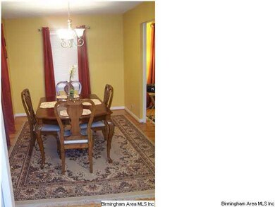 Roomy Dining Room with Hardwood Floors