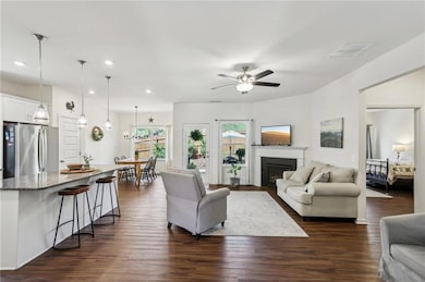 You'll love the seamless flow between kitchen, din