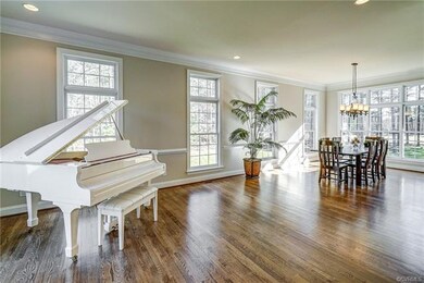 Formal Living Room with Triple Crown Molding & Rec