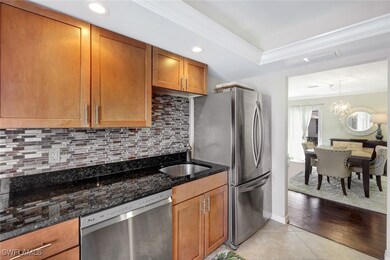 Kitchen featuring light tile patterned flooring, d