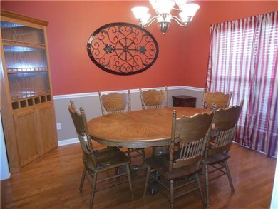Spacious formal dining room, hardwood flooring