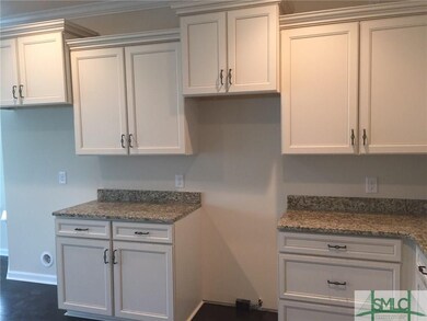 Toasted almond cabinets with hardware