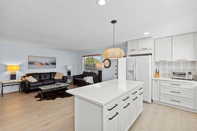 74 Normandy B, Delray Beach, FL 33484 - photo 2