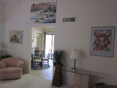 LIVING ROOM WITH VAULTED CEILING