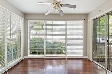 Sunroom featuring wood finished floors