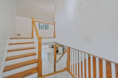 Stairway with tile patterned floors