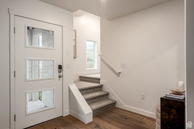 Welcome home! Clean modern lines, fresh paint, and a front porch that’s just begging for a cute doormat and hanging plants.