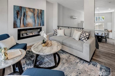 Electric fireplace in lifted living room (photos of lot34, same floorplan)